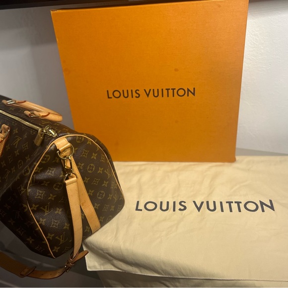 KEEPALL 45 LOUIS VUITTON
DUFFLE TRAVEL WEEKENDER BAG
CROSSBODY DUFFLE BAG/BOX - Picture 12 of 16